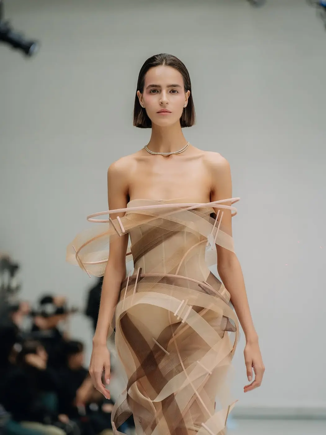 A model in a sheer draped look